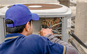 electrician fixing unit of an air conditioner